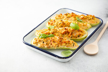 Baked zucchini with chicken and herbs