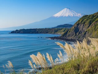 Obraz premium Serene Mount Fuji Landscape with Coastal View and Pampas Grass in Foreground