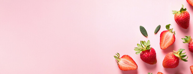 Generated image淡いピンク色のテーブルに苺の断面を美しく並べた背景