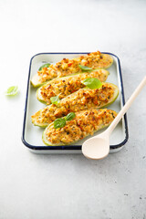 Baked zucchini with chicken and herbs
