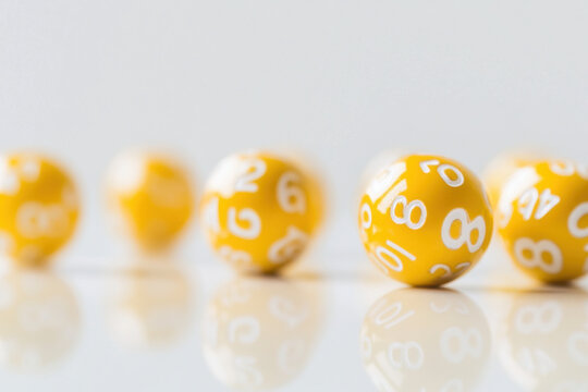 Blurred Lottery Balls with Numbers in Focus for Luck and Fortune Concepts
