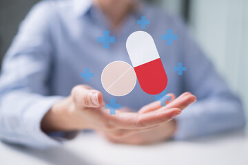 Healthcare worker doctor physician holding pill and capsule medicine prescription concept