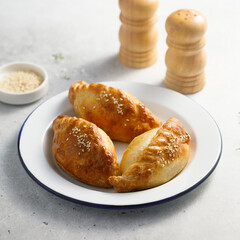 Traditional Russian pies with sesame seeds