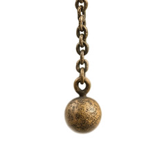 Swinging metallic ball chain transparent background close-up abstract concept