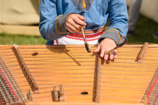 Top View of Woman&rsquo;s Hands Playing Ancient Gusli String Instrument