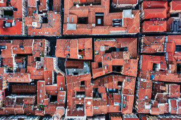 Aerial drone view of streets and rooftops in the old town, Verona, Italy