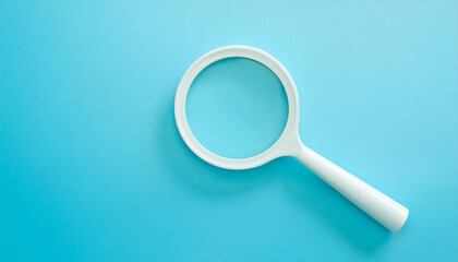White magnifying glass on pastel blue background.