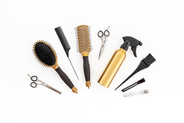 Layout of hairdresser tools set, top view. Combs and scissors on white background