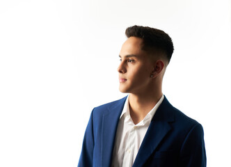 Young businessman looking sideways in corporate photo shoot