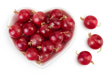 Red gooseberry in ceramic bowl isolated on white background. Top view. Flat lay.