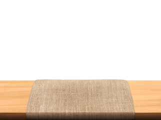Empty sackcloth on wooden table PNG transparent.