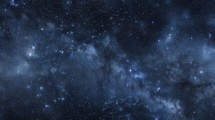 Fototapeta premium A night sky with a hazy band of stars forming the Milky Way.