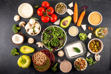 Plant based keto food background with low carb vegan keto diet ingredients, healthy vegetarian fat...