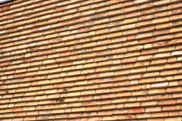 Old brick wall, old texture of red orange stone blocks