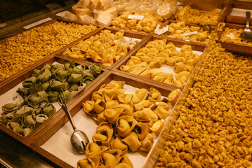 Showcase with Traditional fresh green pasta in Bologna  © boryanam