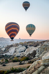 Beautiful landscape with rocks and balloons from Cappadocia ,Turkey