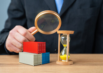 A man studies freight transportation terms. Acceleration of cargo customs clearance and eradication of corruption risks. Secure and efficient trade processes.