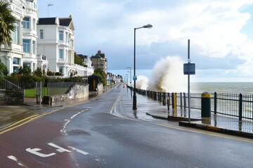 A flood barrier system protecting a coastal city, with gates closed to prevent seawater from flooding streets