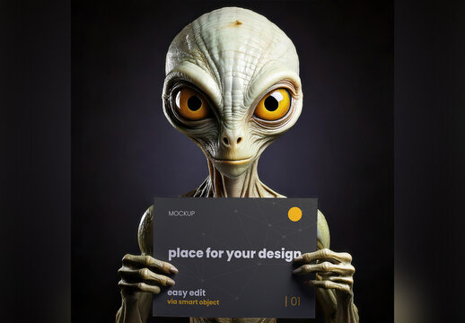 Smiling Alien Holding Horizontal Page Mockup