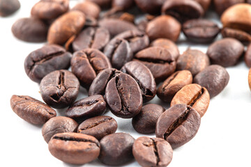 A close-up of roasted coffee beans can be used as a background for your coffee project. Roasted Brown coffee bean