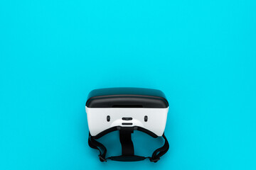 A modern virtual reality headset is showcased against a vibrant blue background, emphasizing its advanced technology for immersive gaming experiences that will attract passionate gamers