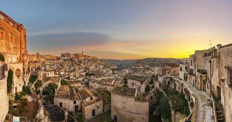 Naklejka premium Matera, Italy Ancient Hilltop Town at Dawn
