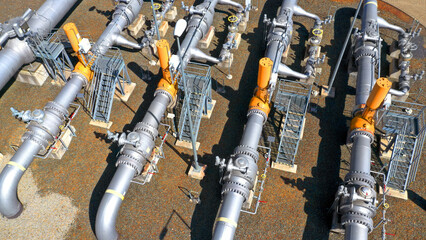 Natural gas pipeline in European Union. High pressure pipes on a hot summer day.	