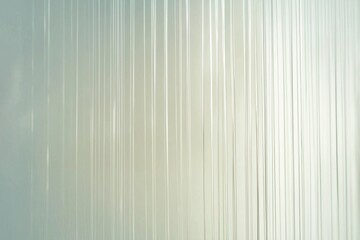 Obraz premium Abstract background featuring soft vertical lines with a gradient effect, evoking calmness and serenity