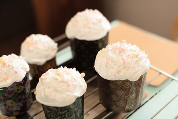 Homemade Easter cakes are ready to decorating at home. Selective focus. Happy Easter concept. Process of cooking at home