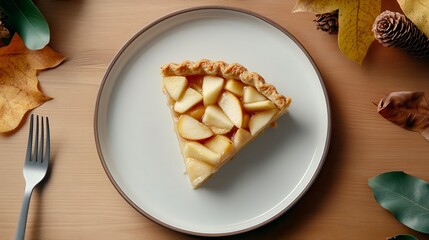 Slice of Apple Pie on a Plate Surrounded by Autumn Leaves and Decor