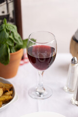 Pouring Red Wine with Italian Cuisine