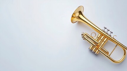 Obraz premium Bright and Shiny Trumpet with Gleaming Surface on Minimal Background