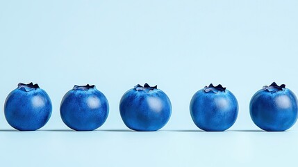 Fresh Blueberries on Light Blue Background for Healthy Food Concepts