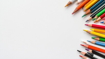Colorful Assortment of Crayons and Pencils Arranged on a White Background for Creative Projects