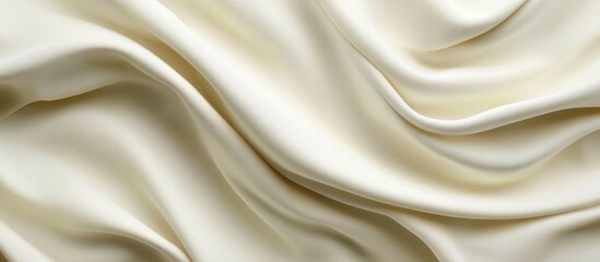 Obraz premium Ivory suede texture with soft folds creating an elegant backdrop ideal for text placement and design accents
