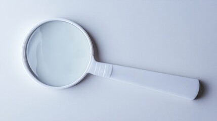Large white magnifying glass isolated on a clean white background showcasing clarity and focus for investigative and analytical themes.