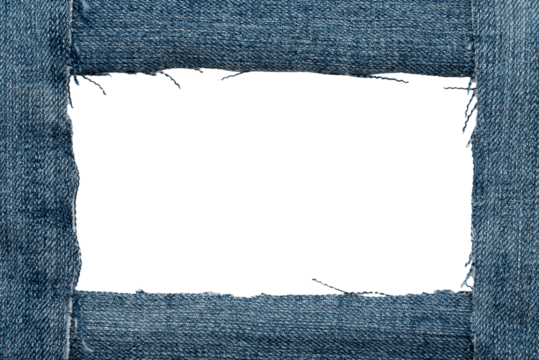 Hole in denim on a white background. Ripped jeans