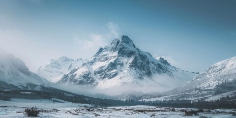 Obraz premium mountaineering peak tranquil winter ice frozen cool high hill landscaped serene horizontal scenery wilderness snowy