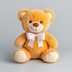 Cute and Adorable Plush Teddy Bear Sitting on a Soft Grey Background for Children and Nursery Decor