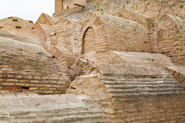 Detailed view of ancient brick necropolis architecture in Khiva, showcasing arched structures and...