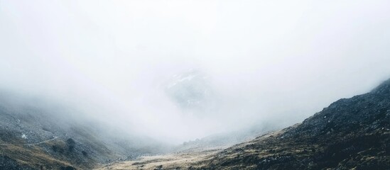 Obraz premium Himalayan Landscape at Thorung La Pass Enveloped in Mist and Snow with Ample Copy Space for Text