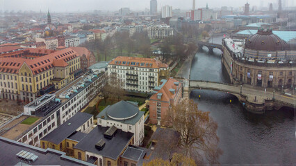 Ukrainian flags over the Bode-Museum in Berlin and Spree river  and Fernsehturm © Marat Lala