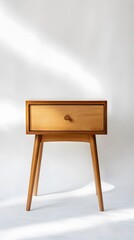 34. A minimalist wooden side table with a simple drawer and smooth edges, displayed against a white backdrop