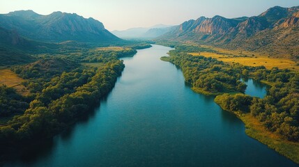 Majestic Mountain Landscape with a Serene River flowing through a valley under a clear sky