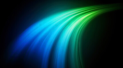 Futuristic abstract background with glowing blue and green light streaks flowing over a dark surface