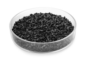 Black plastic granules in petri dish isolated on white
