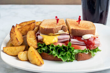 ham sandwich with potato  wedges