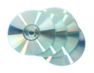 Many shiny compact discs isolated on white, top view