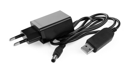 Fototapeta premium Black USB power adapter and charge cable isolated on white