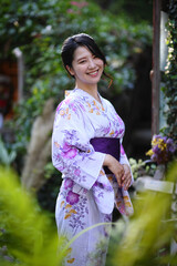 portrait woman with yukata dress in the garden